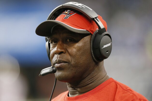 Tampa Bay Buccaneers head coach Lovie Smith is seen on the sidelines during the second half of an NFL football game against the Detroit Lions in Detroit, Sunday, Dec. 7, 2014. (AP Photo/Paul Sancya)