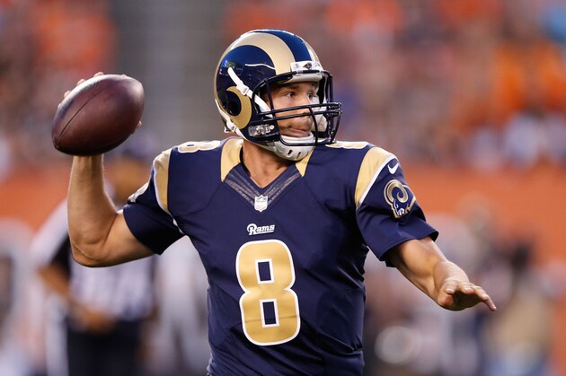 CLEVELAND, OH - AUGUST 23:  Sam Bradford #8 of the St. Louis Rams drops back to pass during the first quarter against the Cleveland Browns at FirstEnergy Stadium on August 23, 2014 in Cleveland, Ohio.  (Photo by Joe Robbins/Getty Images)