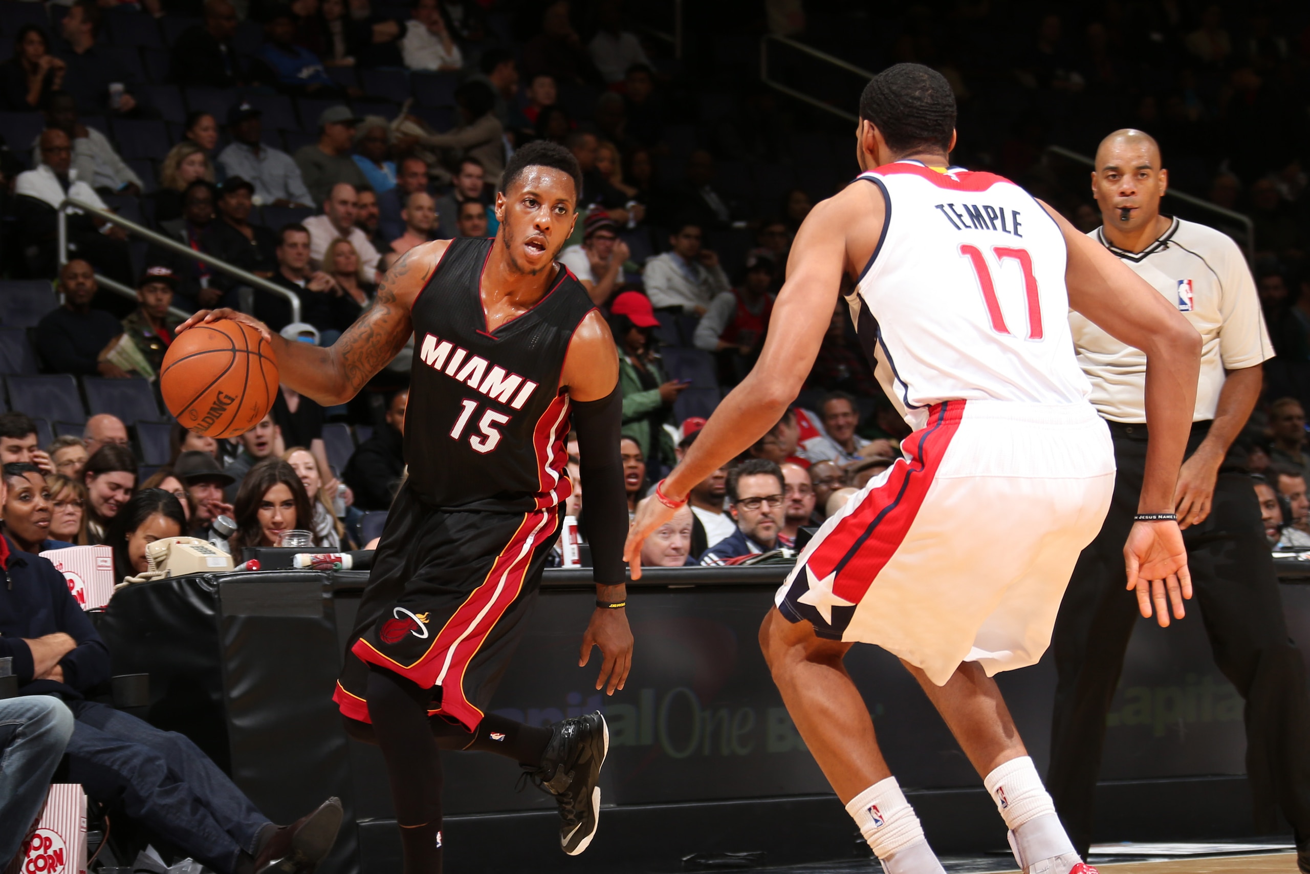 WASHINGTON,DC - December 1: Mario Chalmers #15 of the Miami Heat looks to move the ball against the Washington Wizards during the game on December 1, 2014 at Verizon Center in Washington, DC. NOTE TO USER: User expressly acknowledges and agrees that, by downloading and or using this Photograph, user is consenting to the terms and conditions of the Getty Images License Agreement. Mandatory Copyright Notice: Copyright 2014 NBAE (Photo by Ned Dishman/NBAE via Getty Images) WASHINGTON,DC - December 1: Mario Chalmers #15 of the Miami Heat looks to move the ball against the Washington Wizards during the game on December 1, 2014 at Verizon Center in Washington, DC. NOTE TO USER: User expressly acknowledges and agrees that, by downloading and or using this Photograph, user is consenting to the terms and conditions of the Getty Images License Agreement. Mandatory Copyright Notice: Copyright 2014 NBAE (Photo by Ned Dishman/NBAE via Getty Images)