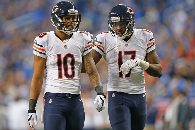 DETROIT, MI - NOVEMBER 27:  Marquess Wilson #10 and Alshon Jeffery #17 of the Chicago Bears talk during a time out in the fourth quarter of the game against the Detroit Lions runs at Ford Field on November 27, 2014 in Detroit, Michigan. The Lions defeated the Bears 34-17.  (Photo by Leon Halip/Getty Images)