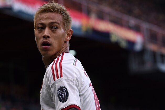 GENOA, ITALY - DECEMBER 07: Keisuke Honda of Milan in action during the Serie A match between Genoa CFC and AC Milan at Stadio Luigi Ferraris on December 7, 2014 in Genoa, Italy. (Photo by Tullio M. Puglia/Getty Images) GENOA, ITALY - DECEMBER 07: Keisuke Honda of Milan in action during the Serie A match between Genoa CFC and AC Milan at Stadio Luigi Ferraris on December 7, 2014 in Genoa, Italy. (Photo by Tullio M. Puglia/Getty Images)