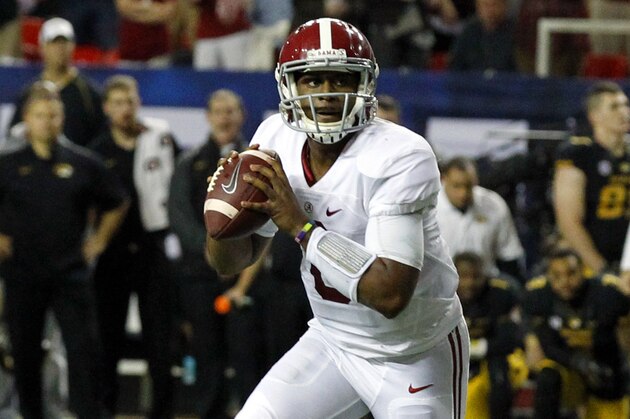 Alabama quarterback Blake Sims (6) rolls out to pass during the second half of an NCAA college football game against Missouri Saturday, Dec. 6, 2014, in Atlanta, Ga. (AP Photo/Butch Dill)