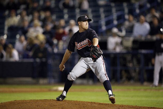 Atlanta Braves' J.R. Graham in action during a spring training exhibition baseball game against the New York Yankees, Tuesday, March 5, 2013, in Tampa, Fla. (AP Photo/Matt Slocum)