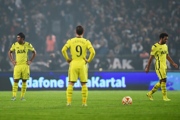 ISTANBUL, TURKEY - DECEMBER 11:  (L-R)  Paulinho, Roberto Soldado and Mousa Dembele of Spurs look dejected as Cenk Tosun of Besiktas (not pictured) scores their first goal during the UEFA Europa League Group C match between Besiktas JK and Tottenham Hotspur FC at Ataturk Olympic Stadium on December 11, 2014 in Istanbul, Turkey.  (Photo by Jamie McDonald/Getty Images)