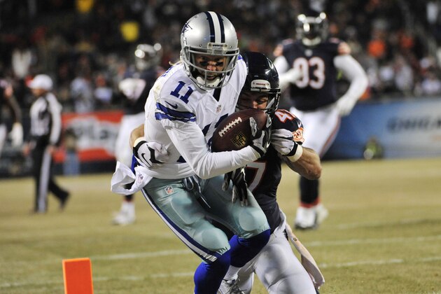 CHICAGO, IL - DECEMBER 4: Cole Beasley #11 of the Dallas Cowboys heads to the end zone for a touchdown as Chris Conte #47 of the Chicago Bears defends during the third quarter of a game at Soldier Field on December 4, 2014 in Chicago, Illinois. The Cowboys defeated the Bears 41-28. (Photo by David Banks/Getty Images)