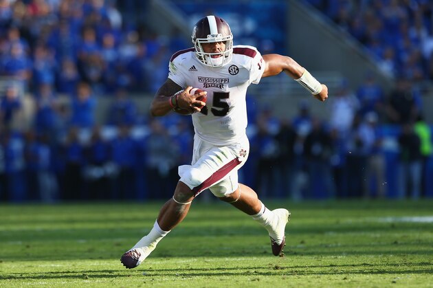 LEXINGTON, KY - OCTOBER 25:  Dak Prescott #15 of the Mississippi State Bulldogs runs with the ball during the game against the Kentucky Wildcats at Commonwealth Stadium on October 25, 2014 in Lexington, Kentucky.  (Photo by Andy Lyons/Getty Images)