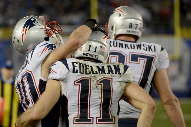 SAN DIEGO, CA-  DECEMBER 7:  Julian Edelman #11 of the New England Patriots celebrates his touchdown with teammates Danny Amendola #80 and Rob Gronkowski #87 during an NFL game at Qualcomm Stadium on December 7, 2014 in San Diego, California. (Photo by Donald Miralle/Getty Images)