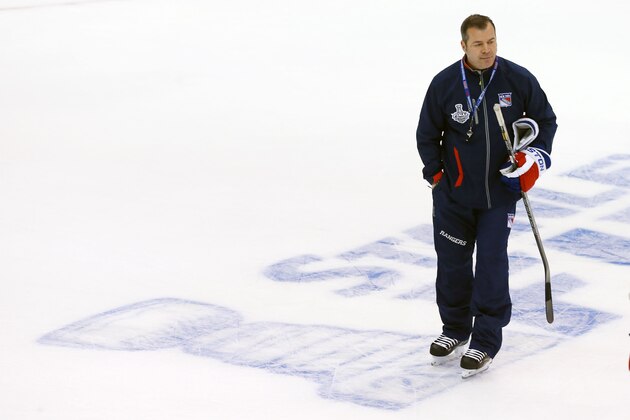 LOS ANGELES, CA - JUNE 03:  Head Coach Alain Vigneault of the New York Rangers gives direction during a practice session ahead of Media Day for the 2014 Stanley Cup Final at Staples Center on June 3, 2014 in Los Angeles, California.  (Photo by Dave Sandford/NHLI via Getty Images)