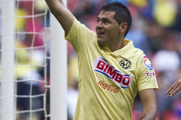 America's Pablo Aguilar celebrates after scoring against Tijuana during a Mexican soccer league match in Mexico City, Saturday, July 26, 2014. (AP Photo/Christian Palma)
