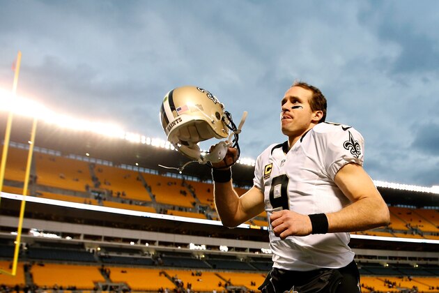 PITTSBURGH, PA - NOVEMBER 30:  Drew Brees #9 of the New Orleans Saints runs off the field after a 35-32 win over the New Orleans Saints at Heinz Field on November 30, 2014 in Pittsburgh, Pennsylvania.  (Photo by Gregory Shamus/Getty Images)