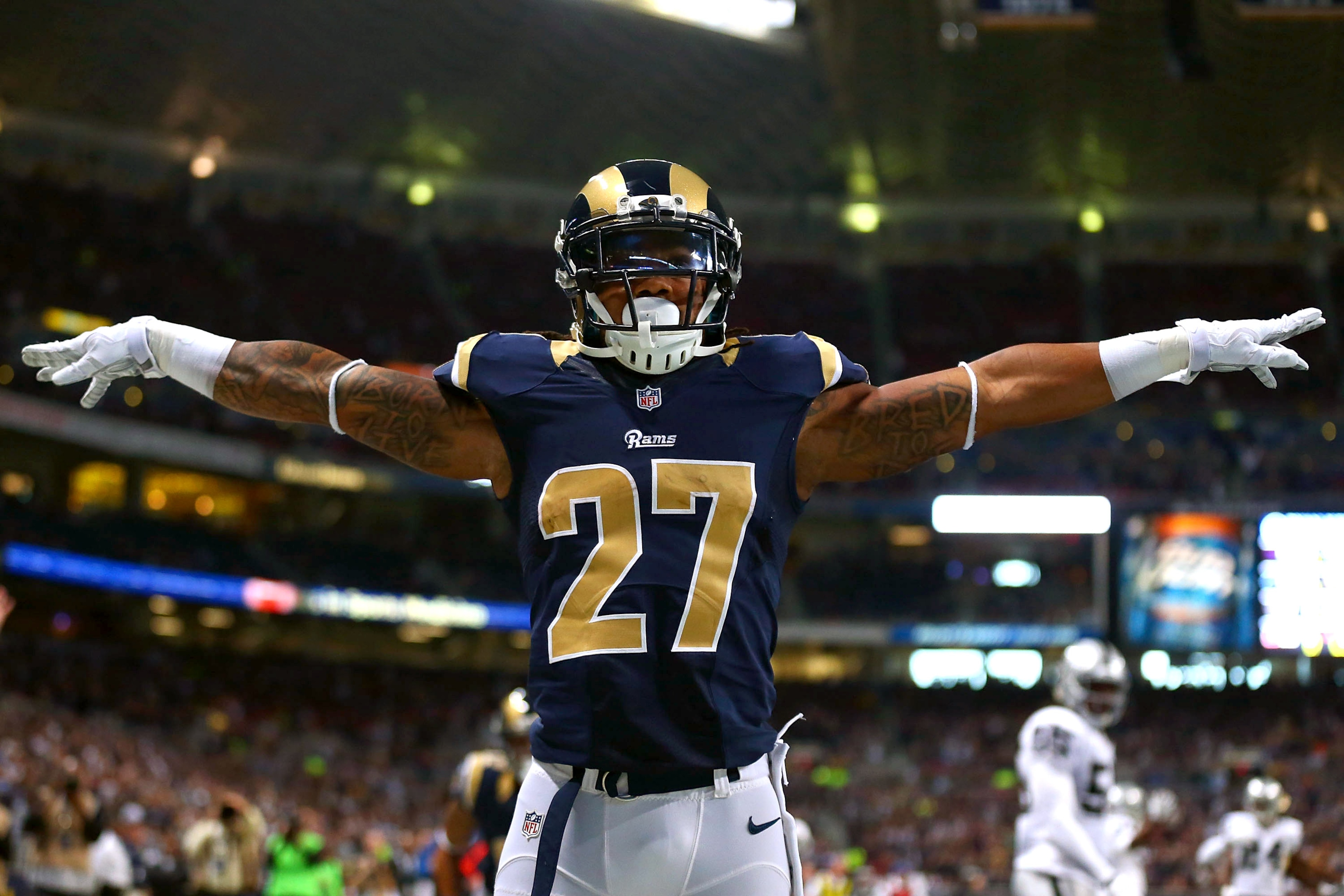ST. LOUIS, MO - NOVEMBER 30: Tre Mason #27 of the St. Louis Rams celebrates after scoring a touchdown against the Oakland Raiders in the first quarter at the Edward Jones Dome on November 30, 2014 in St. Louis, Missouri. (Photo by Dilip Vishwanat/Getty Images) ST. LOUIS, MO - NOVEMBER 30: Tre Mason #27 of the St. Louis Rams celebrates after scoring a touchdown against the Oakland Raiders in the first quarter at the Edward Jones Dome on November 30, 2014 in St. Louis, Missouri. (Photo by Dilip Vishwanat/Getty Images)