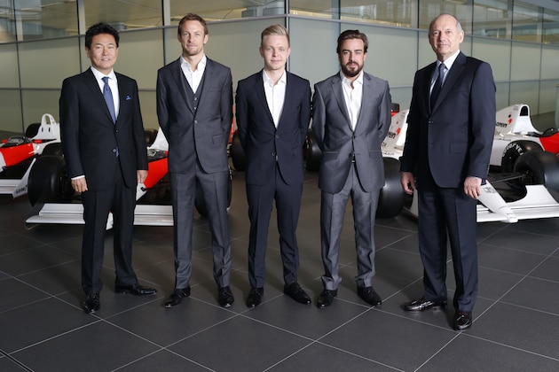 WOKING, ENGLAND- DECEMBER 10: In this handout photo provided by McLaren-Honda, Formula One drivers Fernando Alonso (2nd R) and Jenson Button (2nd L) pose as McLaren-Honda announces its new driver line-up for 2015 with Kevin Magnussen (C) who will remain as test and reserve driver, as Ron Dennis (R), Chairman & Chief Executive Officer, McLaren and Yasuhisa Arai (L), Senior Managing Officer, Honda R&D Co Ltd; Chief Officer of Motorsport, Honda pose with them on December 10, 2014 in Woking, England. (Photo by Steven Tee /McLaren-Honda via Getty Images) WOKING, ENGLAND- DECEMBER 10: In this handout photo provided by McLaren-Honda, Formula One drivers Fernando Alonso (2nd R) and Jenson Button (2nd L) pose as McLaren-Honda announces its new driver line-up for 2015 with Kevin Magnussen (C) who will remain as test and reserve driver, as Ron Dennis (R), Chairman & Chief Executive Officer, McLaren and Yasuhisa Arai (L), Senior Managing Officer, Honda R&D Co Ltd; Chief Officer of Motorsport, Honda pose with them on December 10, 2014 in Woking, England. (Photo by Steven Tee /McLaren-Honda via Getty Images)