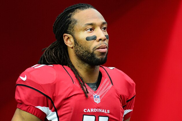GLENDALE, AZ - DECEMBER 07:  Wide receiver Larry Fitzgerald #11 of the Arizona Cardinals gets ready to take the field prior to the NFL game against the Kansas City Chiefs at University of Phoenix Stadium on December 7, 2014 in Glendale, Arizona.  (Photo by Jennifer Stewart/Getty Images)