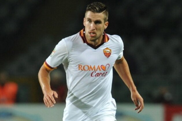 TURIN, ITALY - NOVEMBER 03:  Kevin Strootman of AS Roma in action during the Serie A match between Torino FC and AS Roma at Stadio Olimpico di Torino on November 3, 2013 in Turin, Italy.  (Photo by Valerio Pennicino/Getty Images)