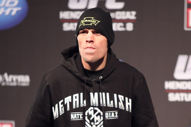 Nate Diaz is seen at the weigh in before his mixed martial arts bout at a UFC on FOX 5 event in Seattle, Friday, Dec. 7, 2012. (AP Photo/Gregory Payan)