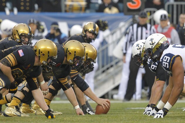 PHILADELPHIA - DECEMBER 8: The offensive line of the Army Black Knights gets set to snap the ball during a game against the Army Black Knights on December 8, 2012 at Lincoln Financial Field in Philadelphia, Pennsylvania. The Navy won 17-13. (Photo by Hunter Martin/Getty Images)