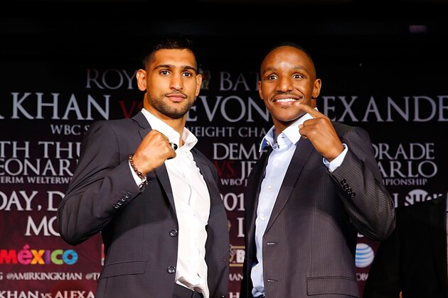 LOS ANGELES, CA - NOVEMBER 04:  Amir Khan and Devon Alexander face off onstage during their fight announcement at The Conga Room on November 4, 2014 in Los Angeles, California.  (Photo by Joe Scarnici/Getty Images)