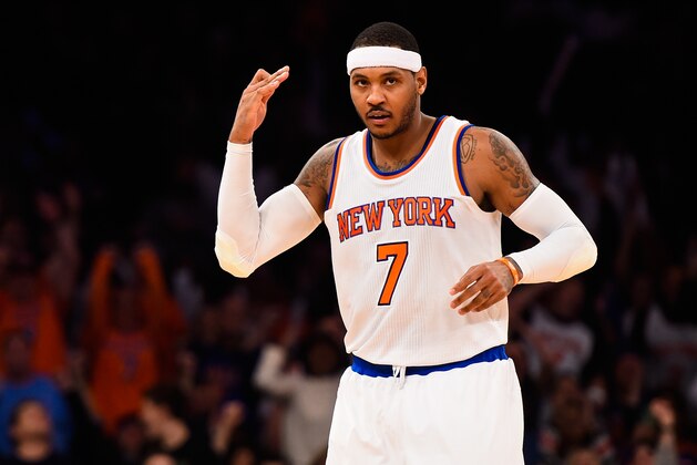 NEW YORK, NY - DECEMBER 07:  Carmelo Anthony #7 of the New York Knicks celebrates a basket in the second half during a game against the Portland Trail Blazers at Madison Square Garden on December 7, 2014 in New York City. NOTE TO USER: User expressly acknowledges and agrees that, by downloading and/or using this photograph, user is consenting to the terms and conditions of the Getty Images License Agreement.  (Photo by Alex Goodlett/Getty Images)