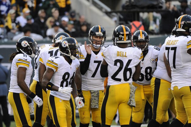 Pittsburgh Steelers quarterback Ben Roethlisberger (7) talks to his team in the huddle during the second half of an NFL football game against the New York Jets Sunday, Nov. 9, 2014, in East Rutherford, N.J. (AP Photo/Bill Kostroun)
