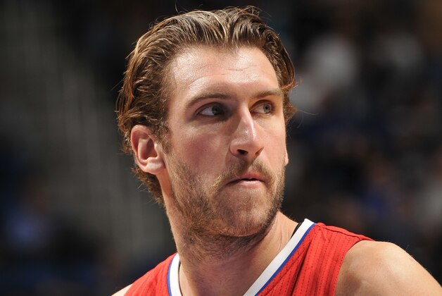 ORLANDO, FL - NOVEMBER 19:  Spencer Hawes #10 of the Los Angeles Clippers during the game against the Orlando Magic on November 19, 2014 at Amway Center in Orlando, Florida. NOTE TO USER: User expressly acknowledges and agrees that, by downloading and or using this photograph, User is consenting to the terms and conditions of the Getty Images License Agreement. Mandatory Copyright Notice: Copyright 2014 NBAE (Photo by Fernando Medina/NBAE via Getty Images)