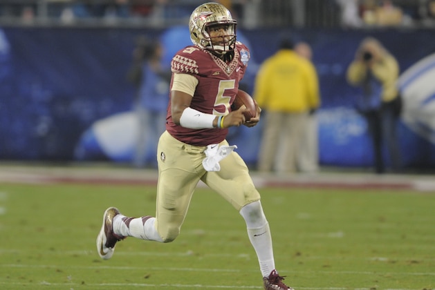 Florida State quarterback Jameis Winston (5) scrambles for a long gain against Georgia Tech during the first half of the Atlantic Coast Conference championship NCAA college football game in Charlotte, N.C., Saturday, Dec. 6, 2014. (AP Photo/Mike McCarn)