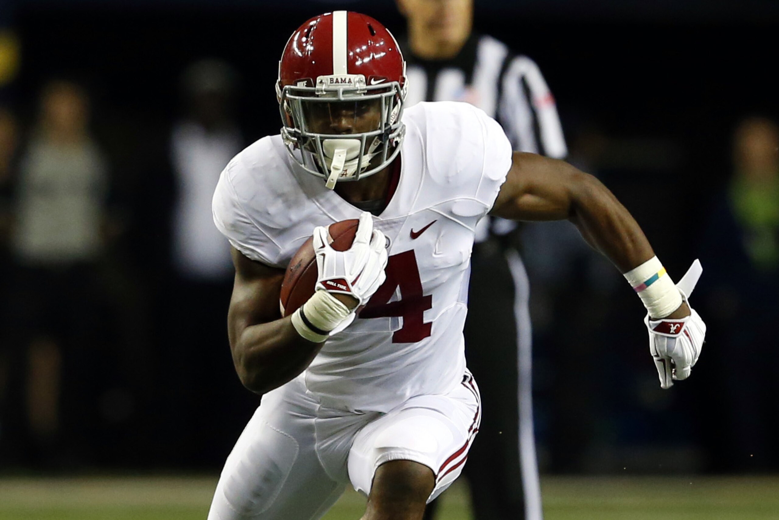 Alabama running back T.J. Yeldon (4) carries the ball during the first half of an NCAA college football game against Missouri Saturday, Dec. 6, 2014, in Atlanta, Ga. (AP Photo/Butch Dill) Alabama running back T.J. Yeldon (4) carries the ball during the first half of an NCAA college football game against Missouri Saturday, Dec. 6, 2014, in Atlanta, Ga. (AP Photo/Butch Dill)