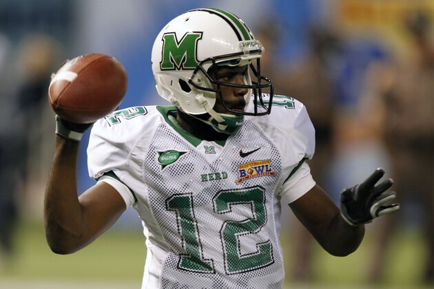 Marshall quarterback Rakeem Cato (12) throws a pass against Florida International during the fourth quarter of the Beef 'O' Brady's Bowl college football game Wednesday, Dec. 21, 2011, in St. Petersburg, Fla. (AP Photo/Chris O'Meara)