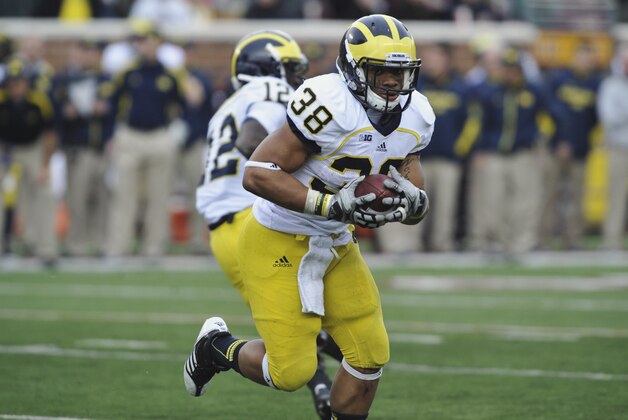 Michigan's Thomas Rawls during an NCAA college football game against Minnesota, Saturday, Nov. 3, 2012, in Minneapolis. (AP Photo/Tom Olmscheid)