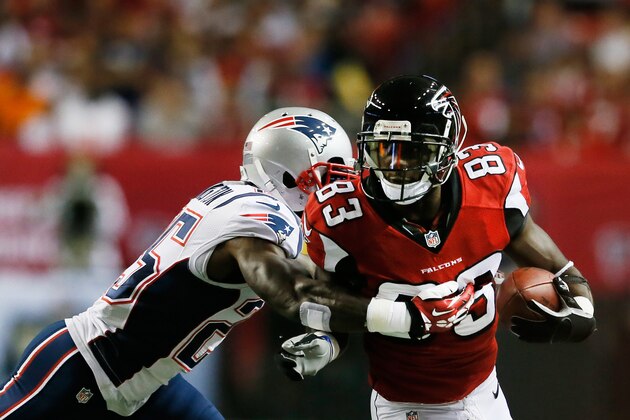 ATLANTA, GA - SEPTEMBER 29:  Kyle Arrington #25 of the New England Patriots tackles  Harry Douglas #83 of the Atlanta Falcons after a completed pass in the first quarter of the game at Georgia Dome on September 29, 2013 in Atlanta, Georgia.  (Photo by Kevin C. Cox/Getty Images)