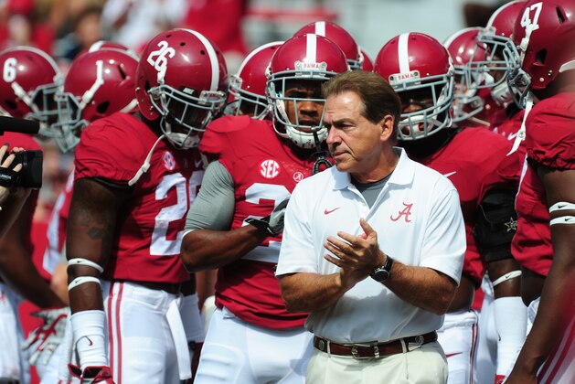 TUSCALOOSA, AL - SEPTEMBER 6: Head Coach Nick Saban of the Alabama Crimson Tide huddles with his team before the game against the Florida Atlantc Owls at Bryant-Denny Stadium on September 6, 2014 in Tuscaloosa, Alabama. (Photo by Scott Cunningham/Getty Images)