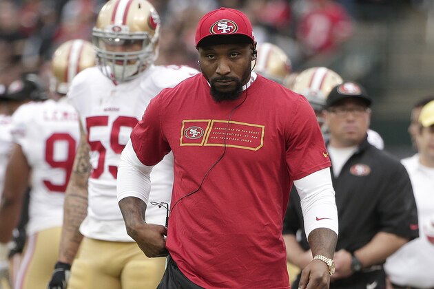 San Francisco 49ers linebacker NaVorro Bowman walks on the sideline during the first half of an NFL football game against the Oakland Raiders in Oakland, Calif., Sunday, Dec. 7, 2014. (AP Photo/Marcio Jose Sanchez)