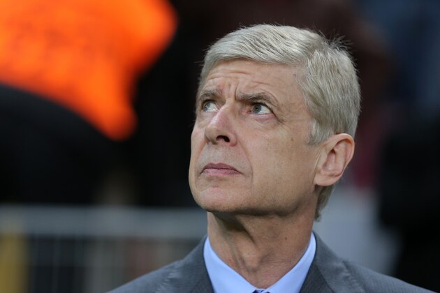 Arsenal's coach Arsene Wenger watches the game during their Champions League Group D soccer match with Galatasaray at the Turk Telekom Arena Stadium in Istanbul, Turkey, Tuesday, Dec. 9, 2014. (AP Photo)