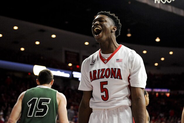 Dec 9, 2014; Tucson, AZ, USA; Arizona Wildcats forward Stanley Johnson (5) celebrates during the first half against the Utah Valley Wolverines at McKale Center. Mandatory Credit: Casey Sapio-USA TODAY Sports