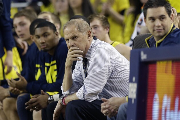 Michigan head coach John Beilein watches from the sidelines during the second half of an NCAA college basketball game against Arizona in Ann Arbor, Mich., Saturday, Dec. 14, 2013. (AP Photo/Carlos Osorio)