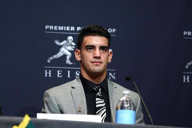 Dec 13, 2014; New  York, NY, USA; Oregon Ducks quarterback Marcus Mariota answers questions during the pre-announcement Heisman finalists press conference at the New York Marriott Marquis. Mandatory Credit: Brad Penner-USA TODAY Sports