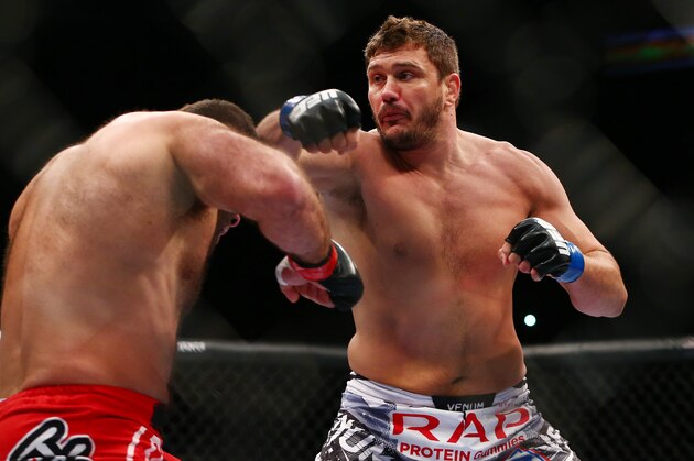 December 13, 2014; Phoenix, AZ, USA; Matt Mitrione hits Gabriel Gonzaga during UFC Fight Night at US Airways Center. Mandatory Credit: Mark J. Rebilas-USA TODAY Sports