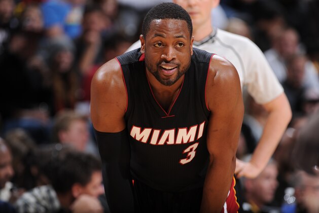 DENVER, CO - DECEMBER 10:  Dwyane Wade #3 of the Miami Heat during the game against the Denver Nuggets on December 10, 2014 at the Pepsi Center in Denver, Colorado. NOTE TO USER: User expressly acknowledges and agrees that, by downloading and/or using this Photograph, user is consenting to the terms and conditions of the Getty Images License Agreement. Mandatory Copyright Notice: Copyright 2014 NBAE (Photo by Garrett Ellwood/NBAE via Getty Images)