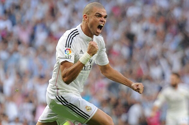 MADRID, SPAIN - OCTOBER 25:  Pepe of Real Madrid CF celebrates after scoring his team's 2nd goal from the penalty spot during the La Liga match between Real Madrid CF and FC Barcelona at Estadio Santiago Bernabeu on October 25, 2014 in Madrid, Spain.  (Photo by Denis Doyle/Getty Images)