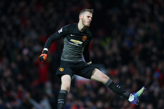 MANCHESTER, ENGLAND - DECEMBER 14:  David De Gea of Manchester United celebrates the third goal during the Barclays Premier League match between Manchester United and Liverpool at Old Trafford on December 14, 2014 in Manchester, England.  (Photo by Alex Livesey/Getty Images)