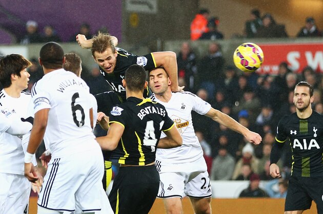 SWANSEA, WALES - DECEMBER 14:  Harry Kane of Tottenham Hotspur heads the opening goal during the Barclays Premier League match between Swansea City and Tottenham Hotspur at Liberty Stadium on December 14, 2014 in Swansea, Wales.  (Photo by Michael Steele/Getty Images)