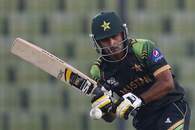 Pakistan's captain Mohammad Hafeez plays a shot during their ICC Twenty20 Cricket World Cup warm up match against New Zealand in Dhaka, Bangladesh, Monday, March 17, 2014. (AP Photo/Aijaz Rahi)
