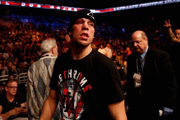 PHOENIX, AZ - DECEMBER 13: Nate Diaz exits the octagon following his loss by unanimous decision to Rafael dos Anjos (not pictured) in their heavyweight bout during the UFC Fight Night event at the at U.S. Airways Center on December 13, 2014 in Phoenix, Arizona. (Photo by Christian Petersen/Getty Images) PHOENIX, AZ - DECEMBER 13: Nate Diaz exits the octagon following his loss by unanimous decision to Rafael dos Anjos (not pictured) in their heavyweight bout during the UFC Fight Night event at the at U.S. Airways Center on December 13, 2014 in Phoenix, Arizona. (Photo by Christian Petersen/Getty Images)