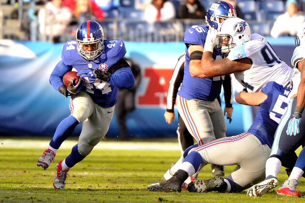 NASHVILLE, TN - DECEMBER 07:  Andre Williams #44 of the New York Giants rushes against the Tennessee Titans during the second half of a game at LP Field on December 7, 2014 in Nashville, Tennessee.  (Photo by Frederick Breedon/Getty Images)