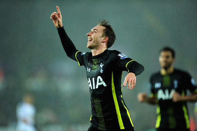 SWANSEA, WALES - DECEMBER 14:  Spurs player Christian Eriksen celebrates after scoring the second Spurs goal during the Barclays Premier League match between Swansea City and Tottenham Hotspur at Liberty Stadium on December 14, 2014 in Swansea, Wales.  (Photo by Stu Forster/Getty Images)