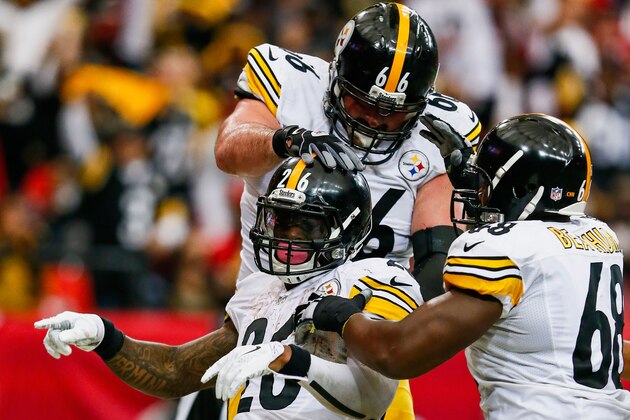 ATLANTA, GA - DECEMBER 14: Le'Veon Bell #26 of the Pittsburgh Steelers celebrates a touchdown with David DeCastro #66 and Kelvin Beachum #68 in the first half against the Atlanta Falcons at the Georgia Dome on December 14, 2014 in Atlanta, Georgia.  (Photo by Kevin C. Cox/Getty Images)
