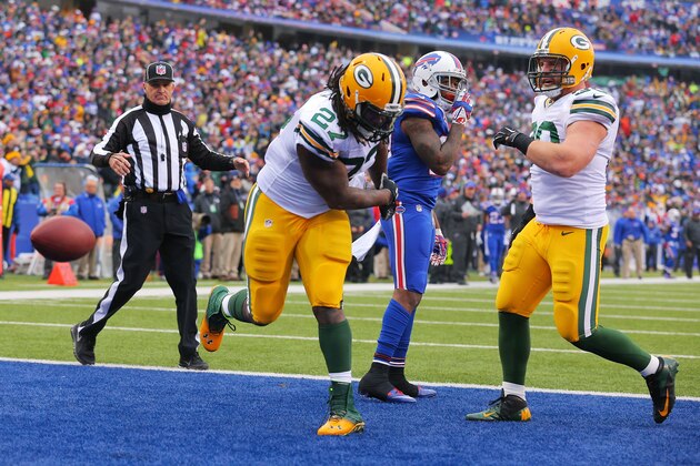 ORCHARD PARK, NY - DECEMBER 14:  Eddie Lacy #27 of the Green Bay Packers celebrates a touchdown against the Buffalo Bills during the first half at Ralph Wilson Stadium on December 14, 2014 in Orchard Park, New York.  (Photo by Brett Carlsen/Getty Images)