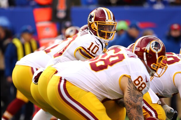 EAST RUTHERFORD, NJ - DECEMBER 14:  Robert Griffin III #10 of the Washington Redskins calls a play in the first quarter against the New York Giants during their game at MetLife Stadium on December 14, 2014 in East Rutherford, New Jersey.  (Photo by Al Bello/Getty Images)