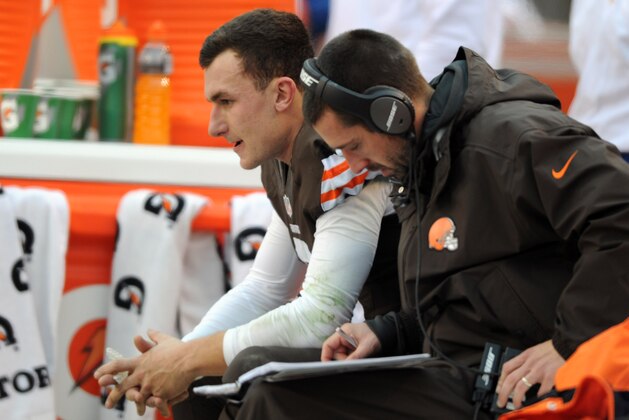 Dec 14, 2014; Cleveland, OH, USA; Cleveland Browns quarterback Johnny Manziel (2) on the bench during the second quarter after throwing an interception against the Cincinnati Bengals at FirstEnergy Stadium. Mandatory Credit: Ken Blaze-USA TODAY Sports