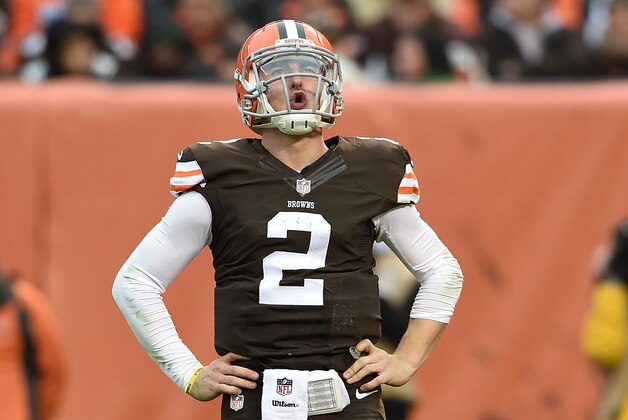 CLEVELAND, OH - DECEMBER 14:  Johnny Manziel #2 of the Cleveland Browns reacts after being sacked during the third quarter against the Cincinnati Bengals at FirstEnergy Stadium on December 14, 2014 in Cleveland, Ohio.  (Photo by Jason Miller/Getty Images)