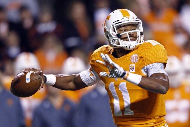 Tennessee quarterback Joshua Dobbs throws to a receiver in the first half of an NCAA college football game against Missouri, Saturday, Nov. 22, 2014, in Knoxville, Tenn. (AP Photo/Wade Payne)